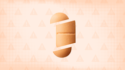 In the center of a light orange peach background with texture and warning sign pattern is a peach oblong pill cut into thirds. 
GoodRx Health