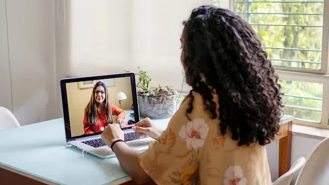 Health: Mental health: woman in virtual therapy session 1407320319