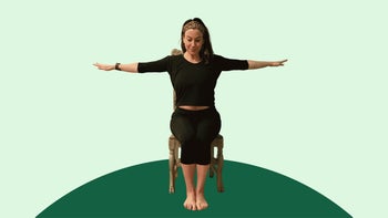 Senior health: woman doing yoga chair eagle