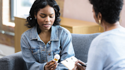 A woman is speaking with a healthcare provider about prescriptions.
SDI Productions/E+ via Getty Images