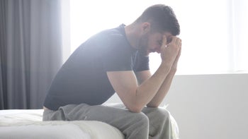 Suboxone: man with head in hands 1263007189