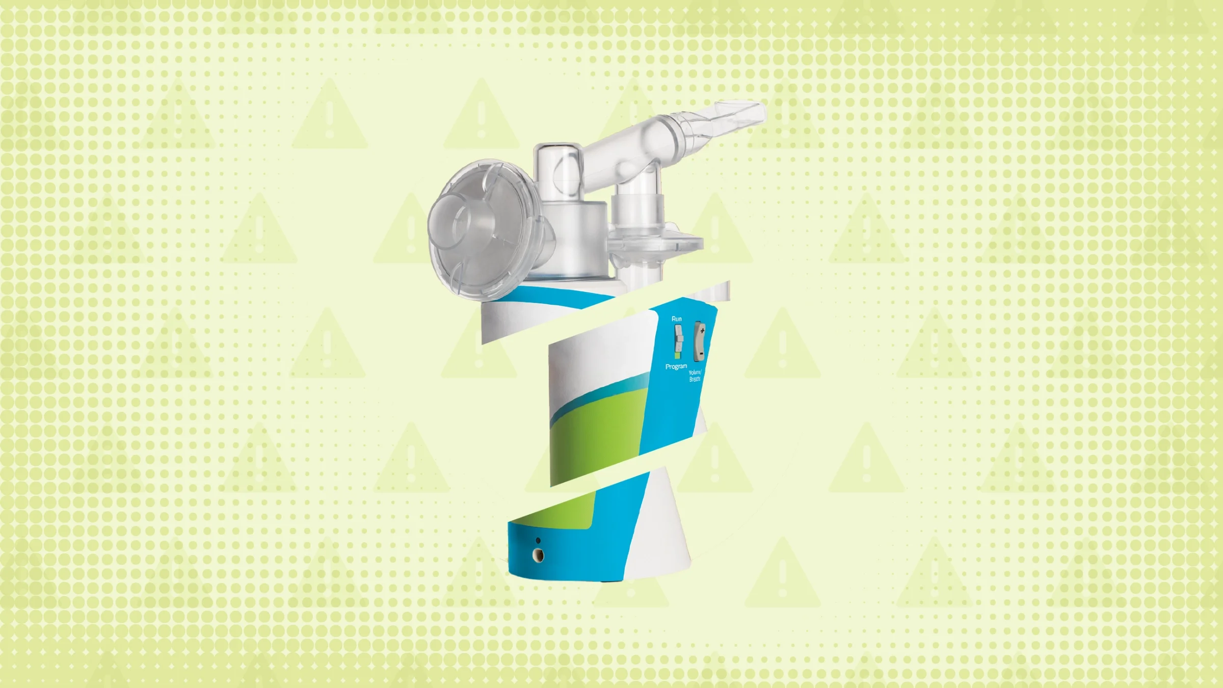 Light green background with texture and warning sign pattern. In the center is a Tyvaso nebulizer cut into thirds.