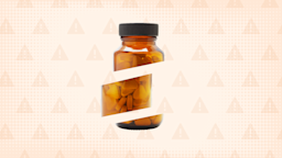 Light orange tan background with a halftone texture and warning sign pattern. In the center is an amber-colored pill bottle, filled with triangular pills, cut apart into three sections.
GoodRx Health