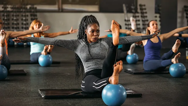 Health: Movement and exercise: women pilates class 1195045259