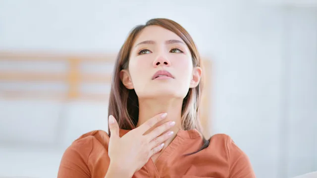 throat: touching throat 1417897716