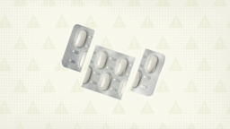 A graphic includes a yellow background with a warning-sign pattern and a blister pack of pills cut into thirds.
GoodRx Health