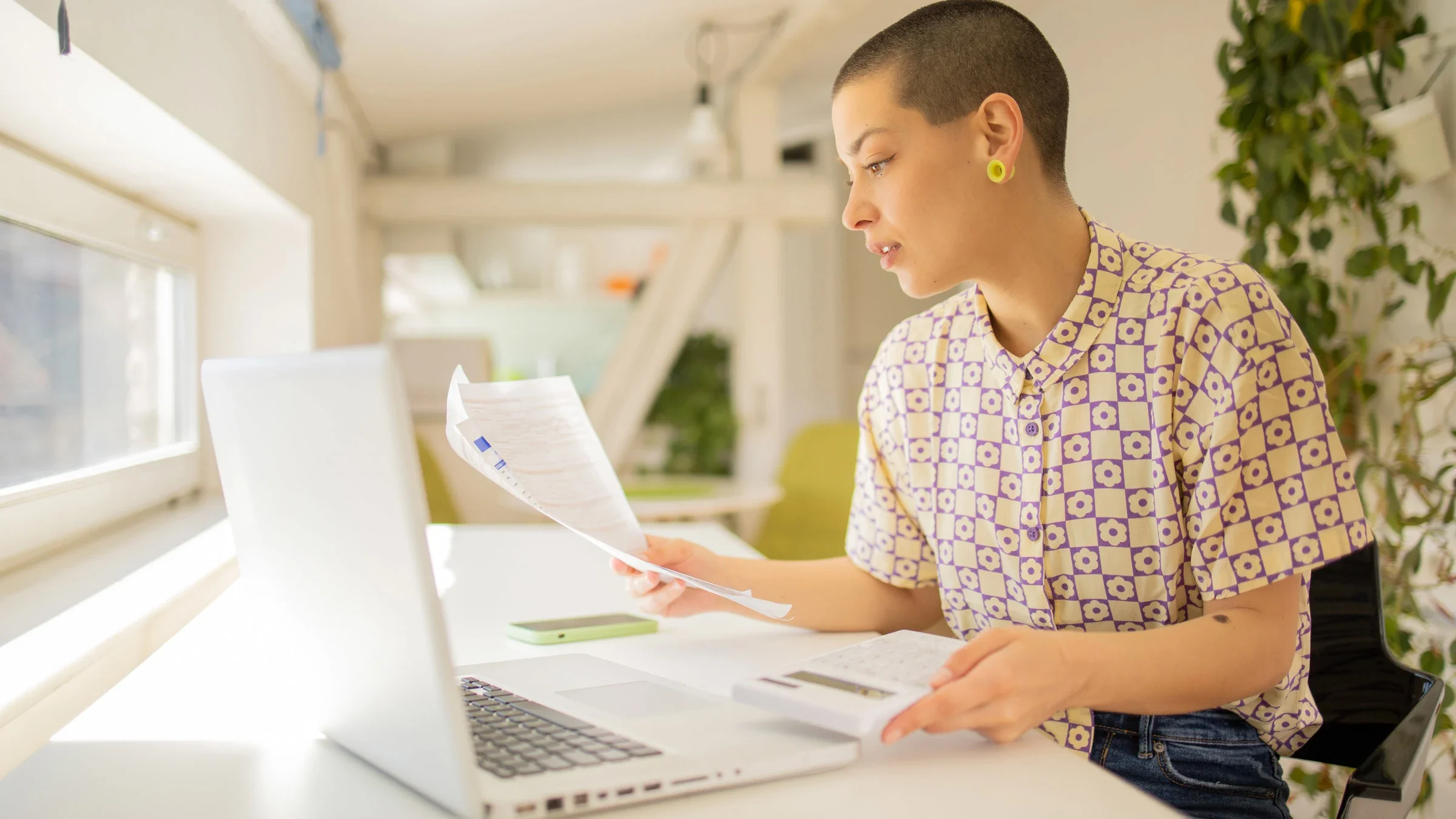 A young adult filing their taxes.
Rockaa/E+ via Getty Images
