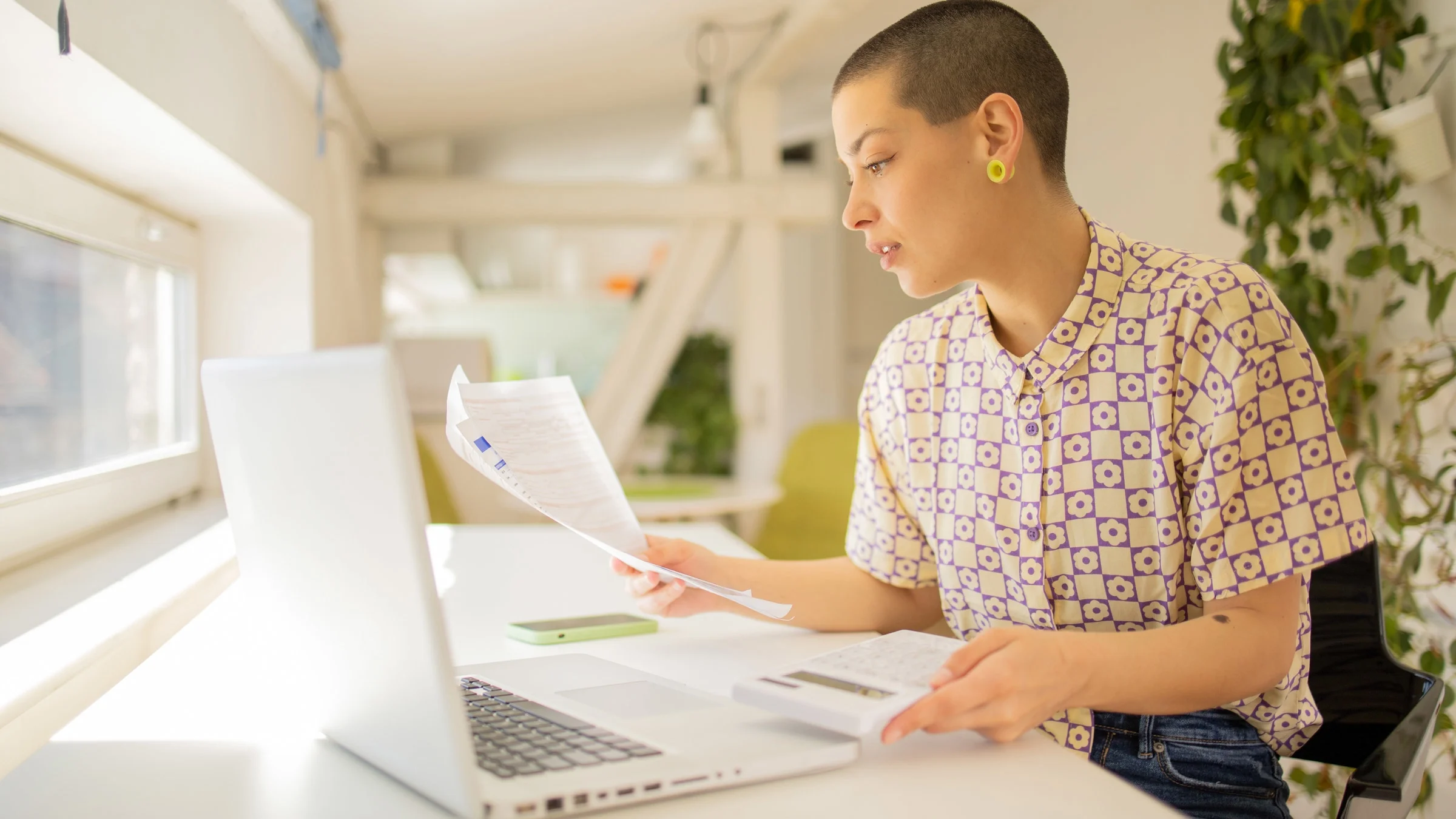A young adult filing their taxes.
