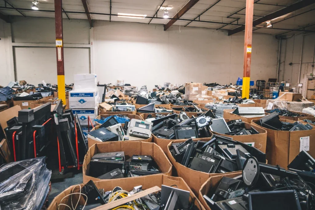 Room full of boxes filled with computers