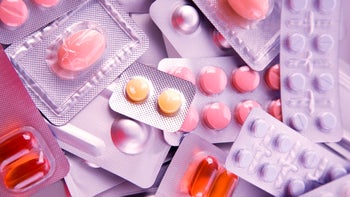 Medication education: Capsule or tablet: pile of pills-172349761