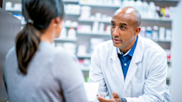 Pharmacist speaking to a patient.
FatCamera/E+ via Getty Images