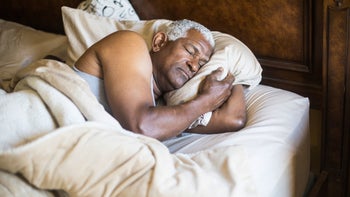 Sleep: senior man asleep in bed GettyImages 937615938