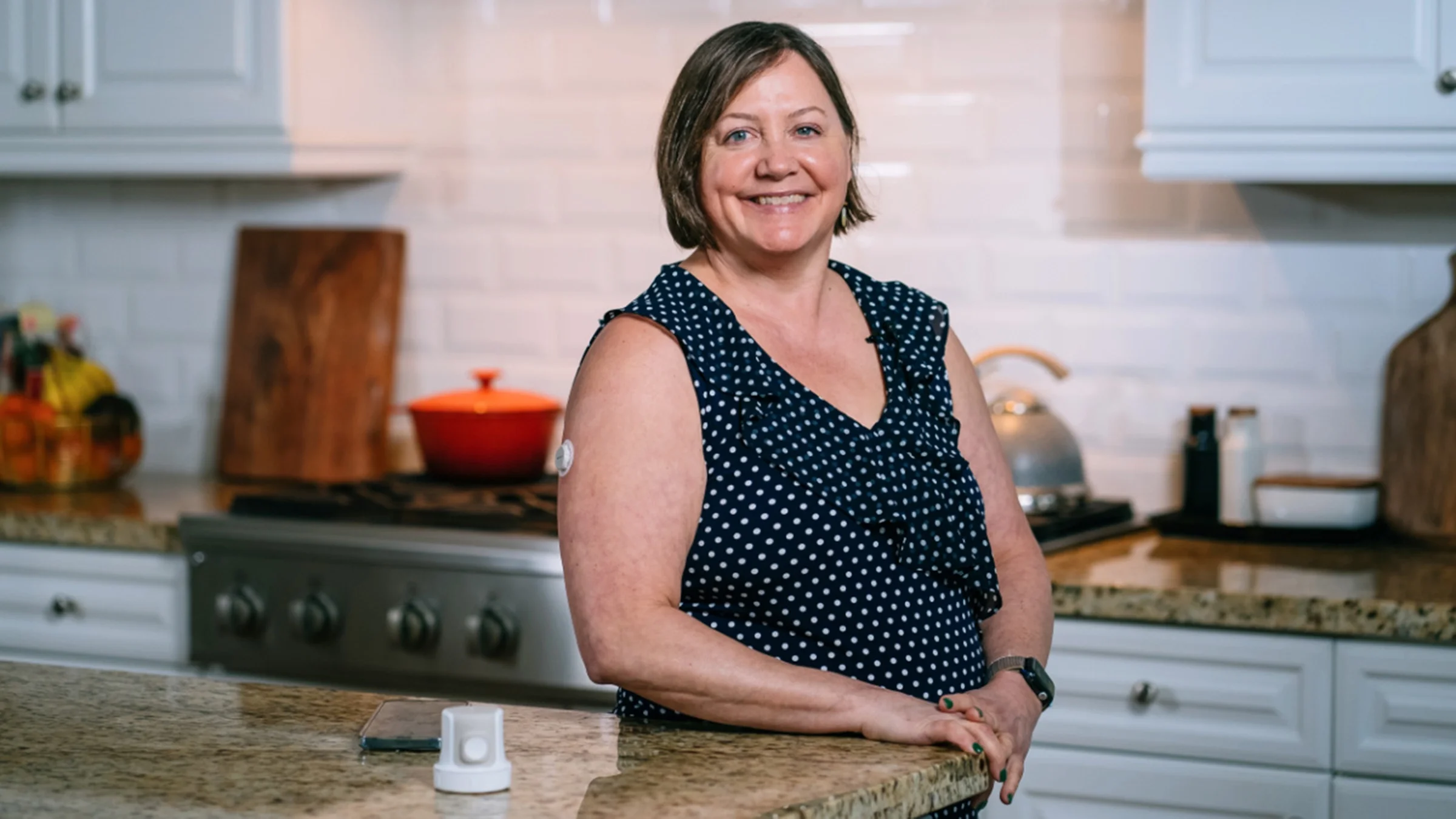 Biz Velatini is pictured in her kitchen.