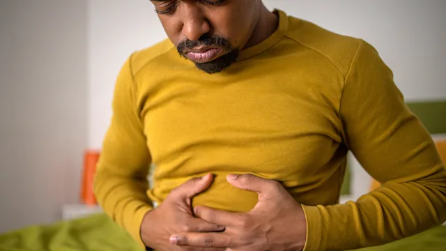 constipation: man with stomach pain 1451150092