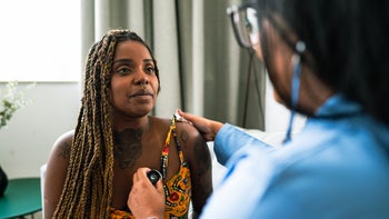 Womens-health: healthcare professional checking patient heartbeat 1458502737