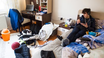 Teen Health: ADHD: Mental Health: teenager in messy bedroom 1087232506