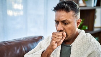 portrait man coughing-1294431977