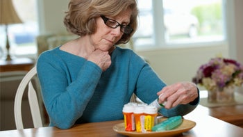 Medication Education: Interactions: looking at pill bottles 102171275