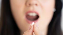 Sublingual tablets dissolve underneath your tongue, bypassing your digestive tract to reach the bloodstream quicker. Learn how sublingually administered medications work and how to take them.
