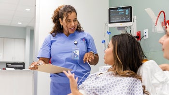 Black-heath: nurse speaking to patient+1732116947
