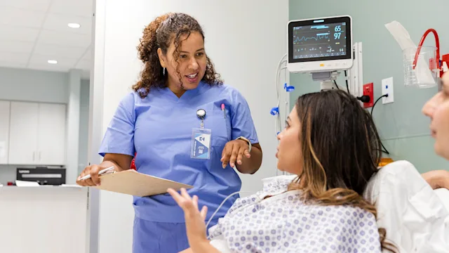 Black-heath: nurse speaking to patient+1732116947