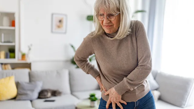 senior woman in pain 2160474952