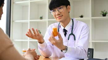 Alcohol use disorder: doctor explaining treatment options 1591588913