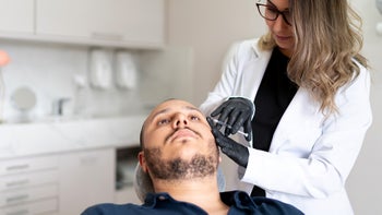 Health: Migraine: man receiving botox 1132279328