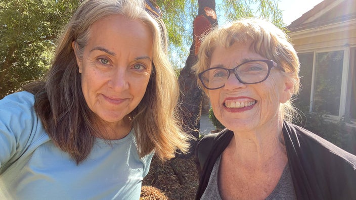 Jere Downs and her stepmother, outdoors