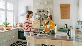 Health: Pantoprazole: mother and daughter having breakfast 1357677910