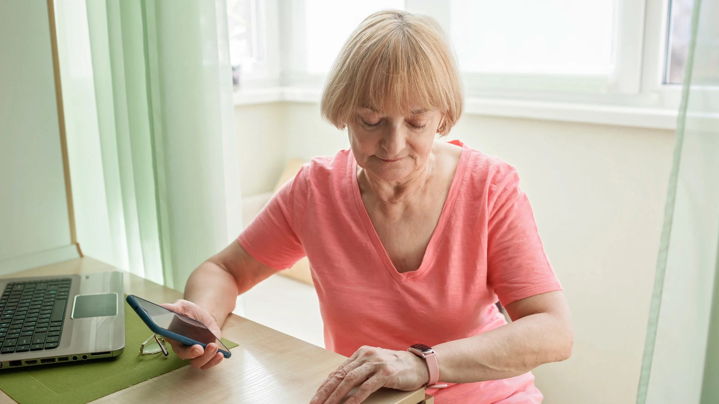 A person checking health info on their smartwatch.