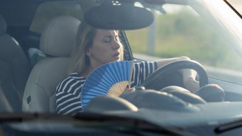 Hyperthermia: Heat exhaustion vs stroke: using hand fan in car-1329912336
