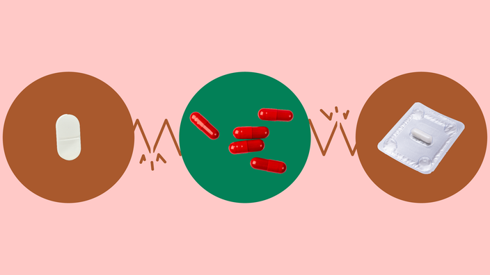 The image shows a light red background with three circles across the frame. In the center, on a green circle, is a pile of red capsule pills. On the left, on a red circle, is a single oblong white pill. On the right, on a red circle, is a single white capsule pill in a blister pack. 