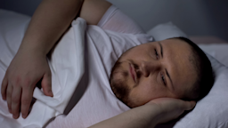 A plus-size person experiencing insomnia.
Motortion/iStock via Getty Images Plus 