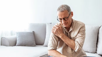 Health: Statins: man with shoulder pain-1306472203