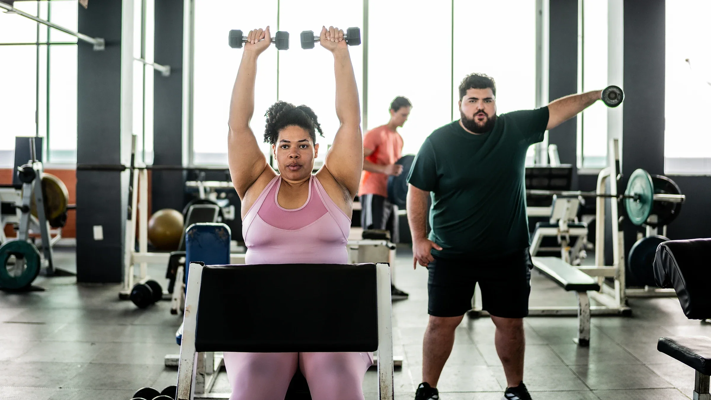 People lifting weights at gym.
FG Trade Latin/iStock via Getty Images Plus