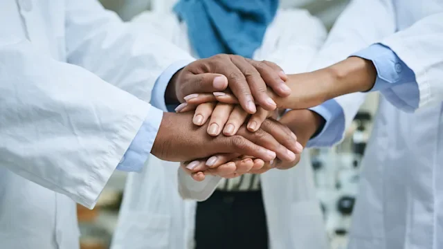 Health: Psoriatic arthritis: closeup group of people hands together 1302453852