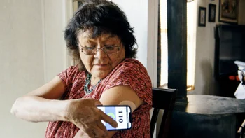 Diabetes: senior woman checks blood sugar with app 1397246965