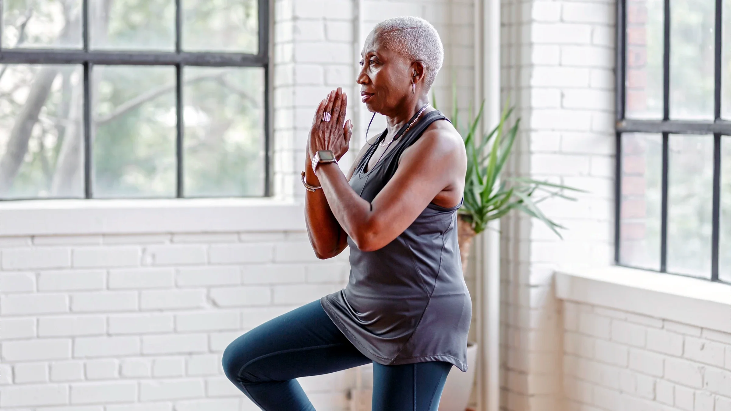 A woman practices yoga.