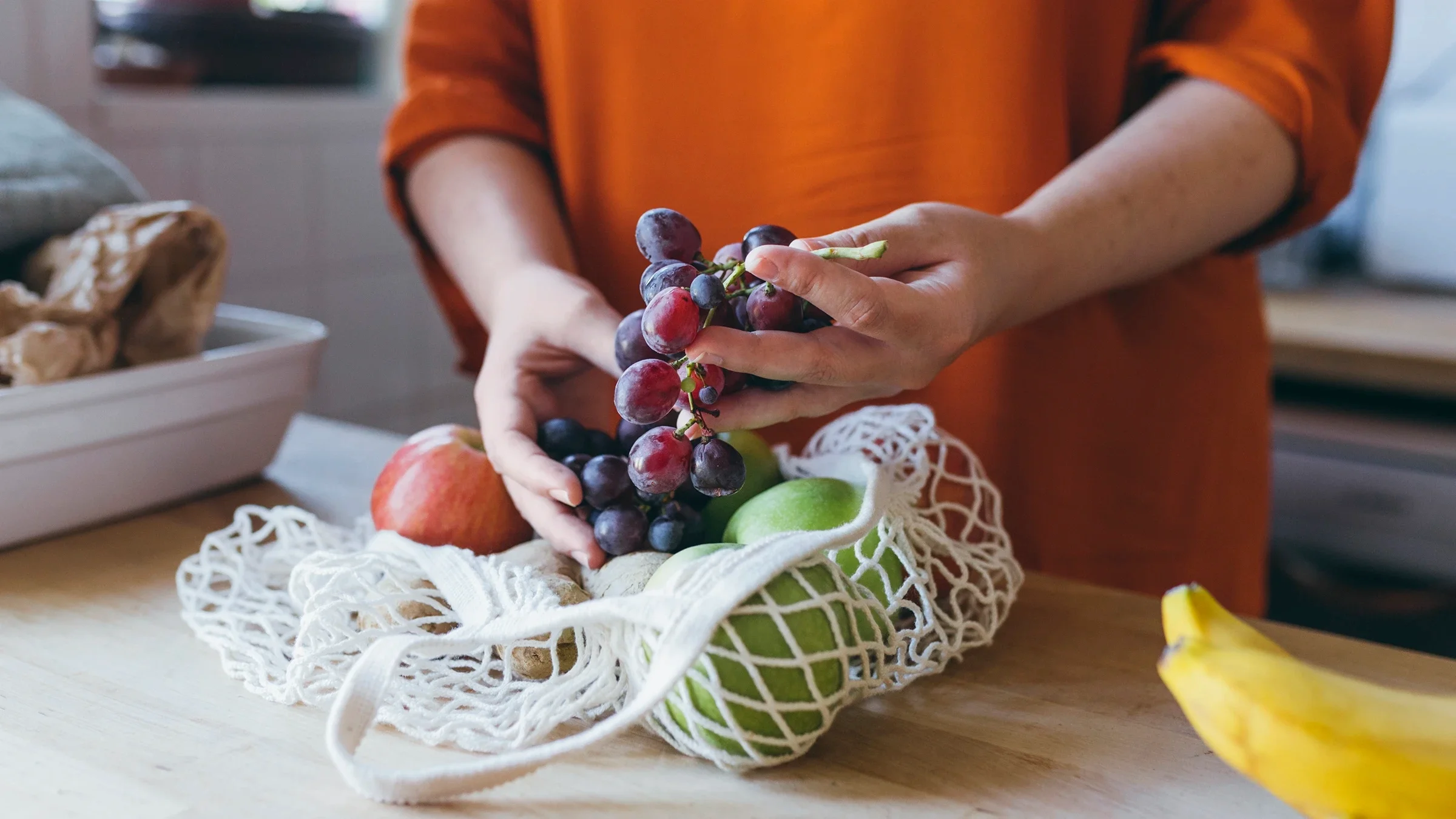 Close-up grapes on a kitchen counter.