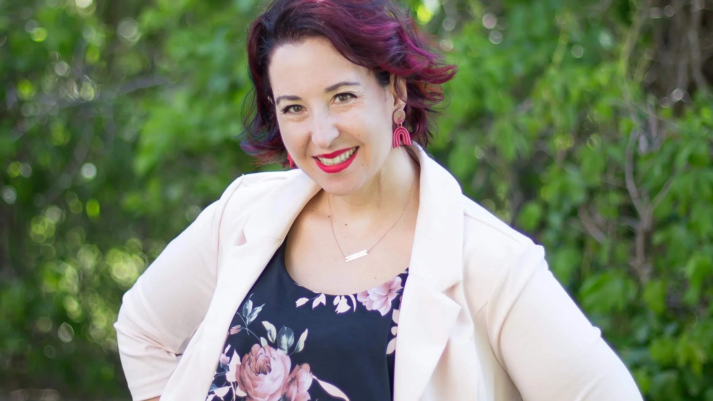 Portrait of multiple sclerosis advocate Jenna Green outdoors.