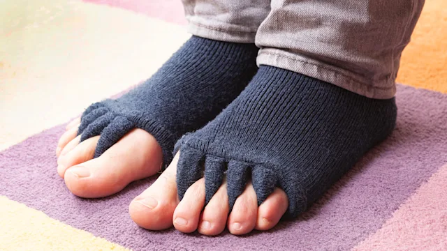 musculoskeletal: feet wearing toe seperator socks 1333961136