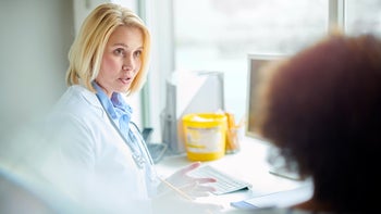 darzalex: medical professional speaking to patient 1207924618