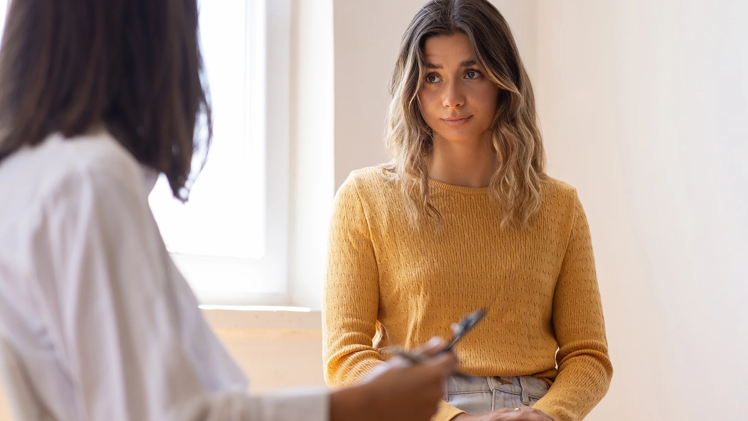 A woman attends a medical appointment.