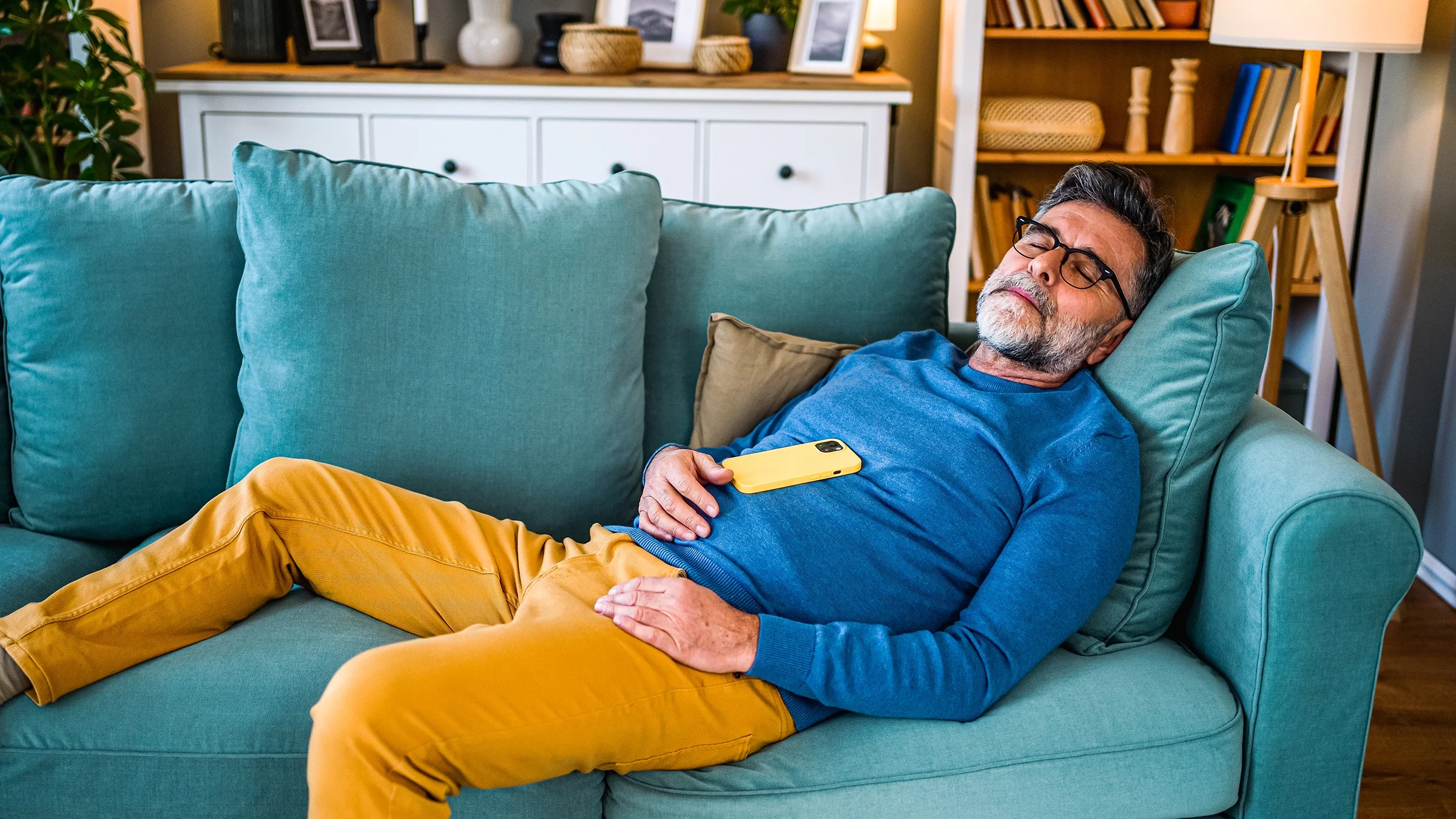 Man napping on the couch.