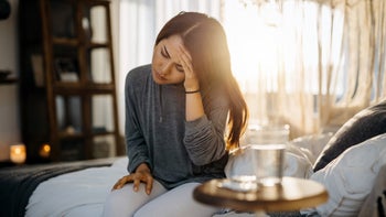 Rizatriptan: woman suffering from a migraine 1222151531