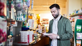 Lamisil: man shopping at pharmacy 1340728243
