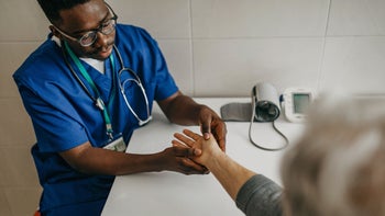 Arthritis: patient wrist examined 1289421913