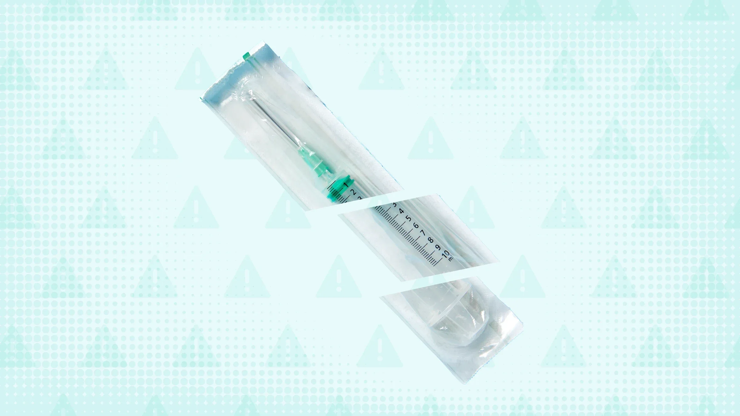 Light teal textured background with warning sign pattern. In the center is a sterile packaged flu shot cut into thirds. 
GoodRx Health
