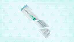 Light teal textured background with warning sign pattern. In the center is a sterile packaged flu shot cut into thirds. 
GoodRx Health
